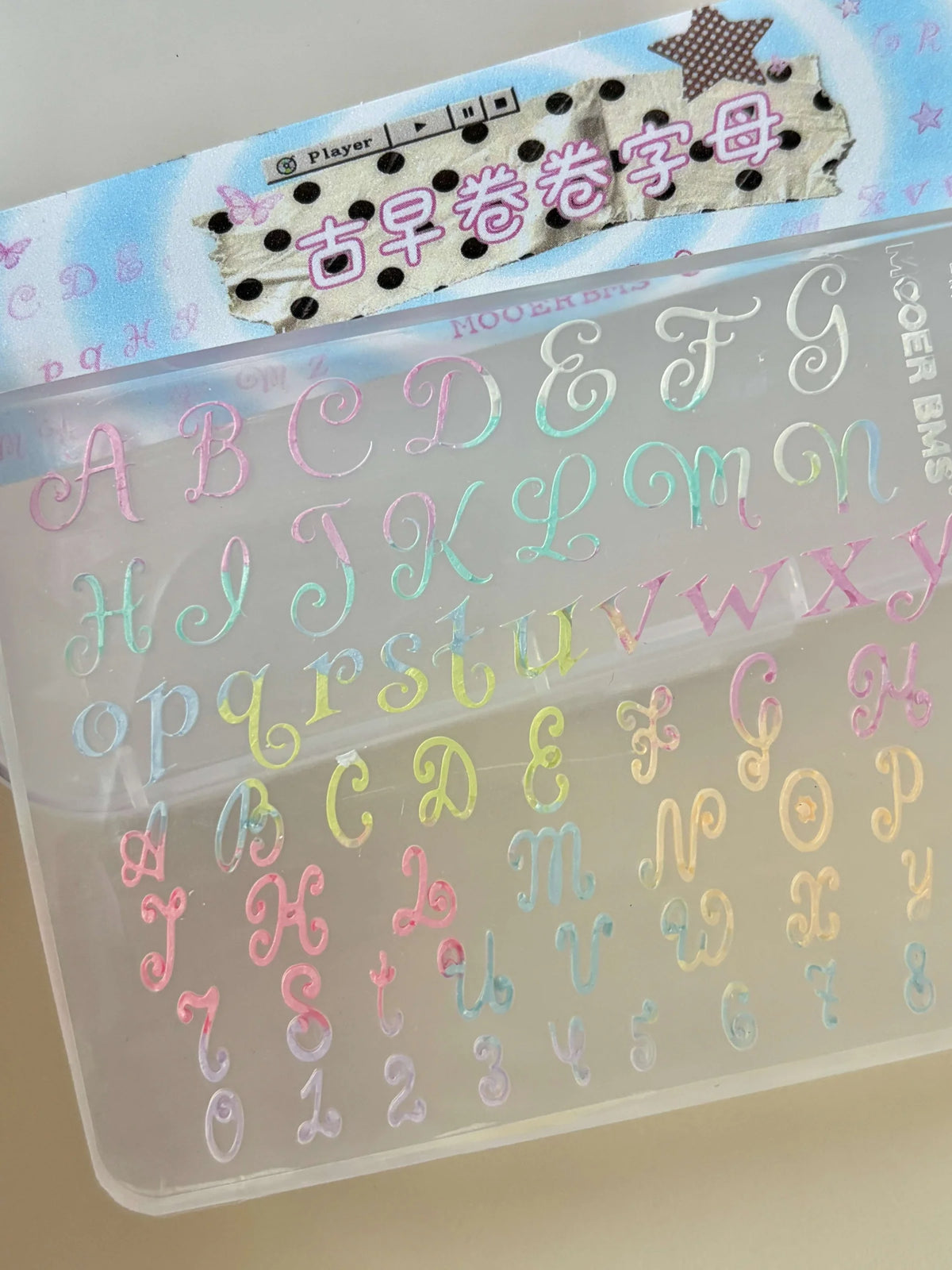 Curly script letters filled with pastel gel