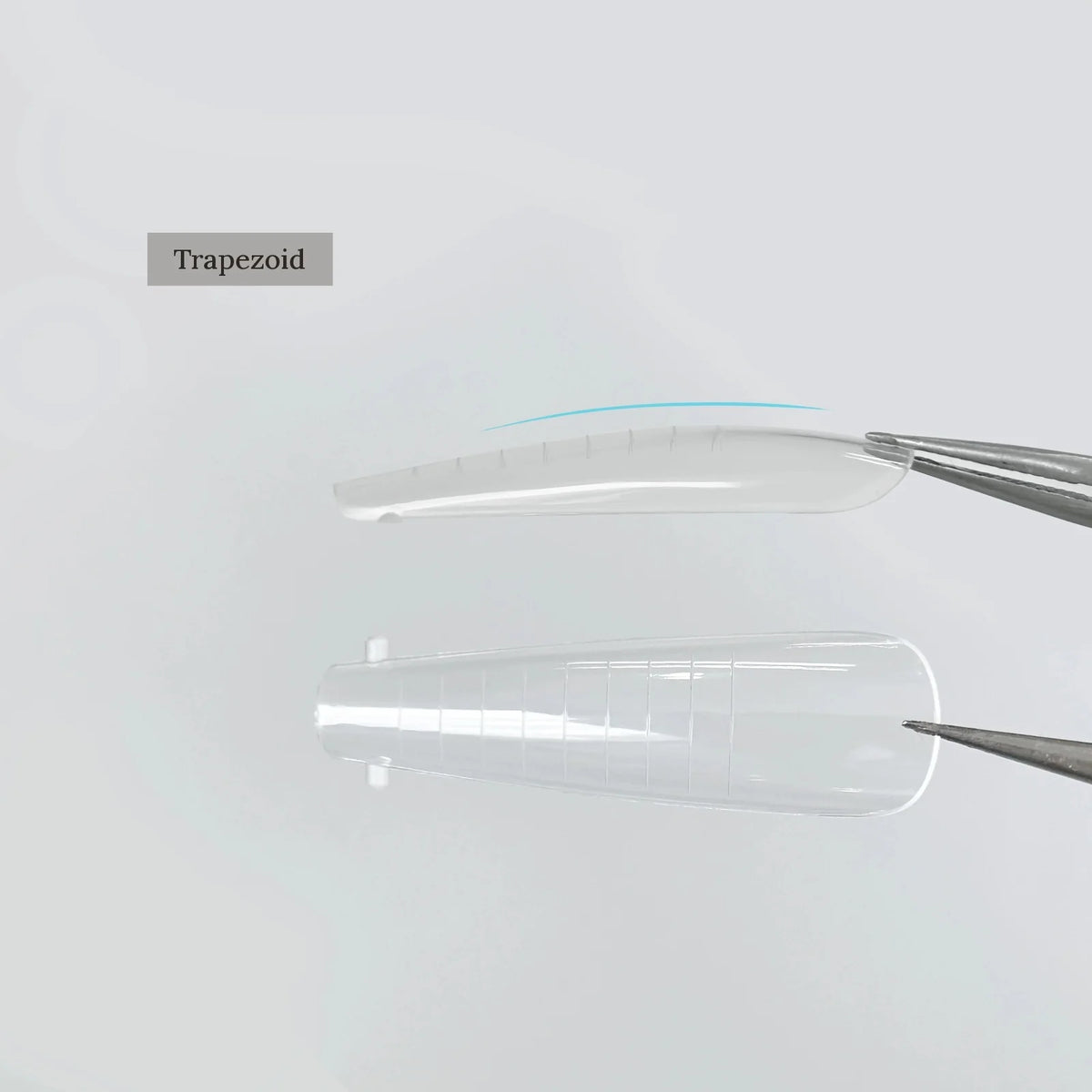 YHH clear dual nail forms, Trapezoid shape, held with tweezers