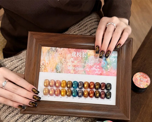 Amber Stream Cat Eye gel shades 01-12 on a swatch board with jars