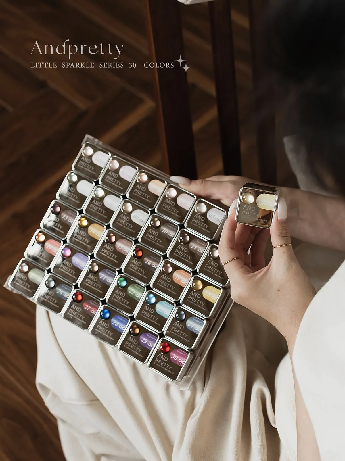 Little Sparkle 30-jar tray held in hand