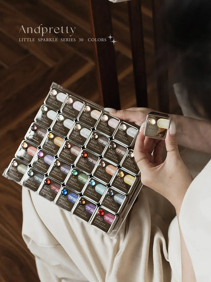 Little Sparkle 30-jar tray held in hand