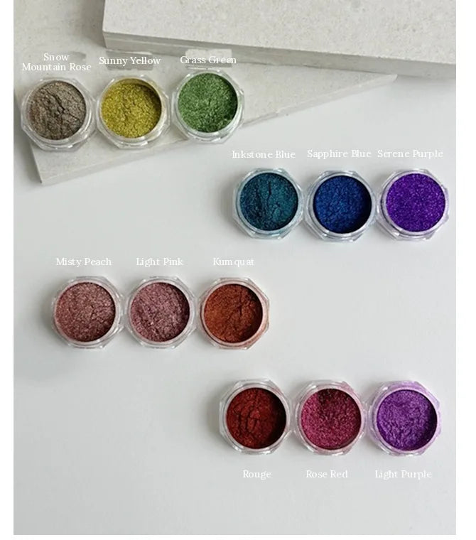 Open jars of all 12 shades, labelled
