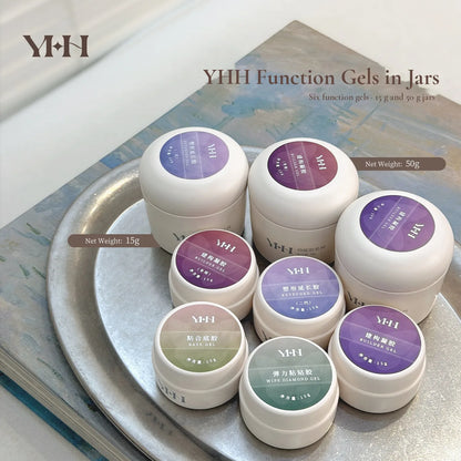 YHH function gels in 15 g and 50 g jars on a tray