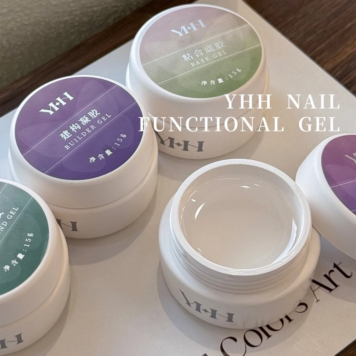 Open jar of clear YHH function gel beside labelled jars