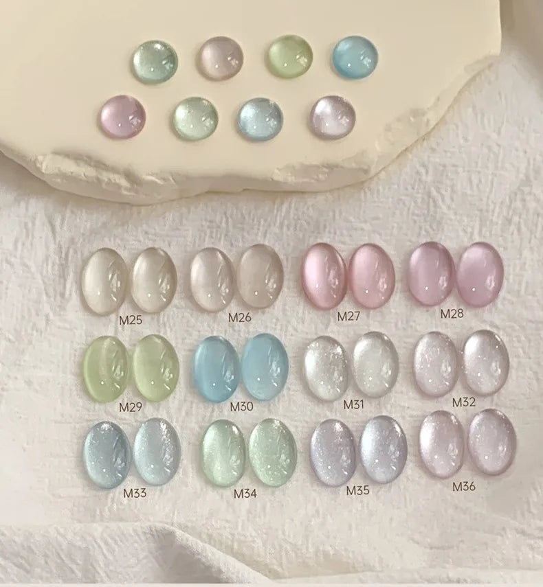 Karries Ice Jelly Cat Eye gel swatches M25-M36 on a stone tray
