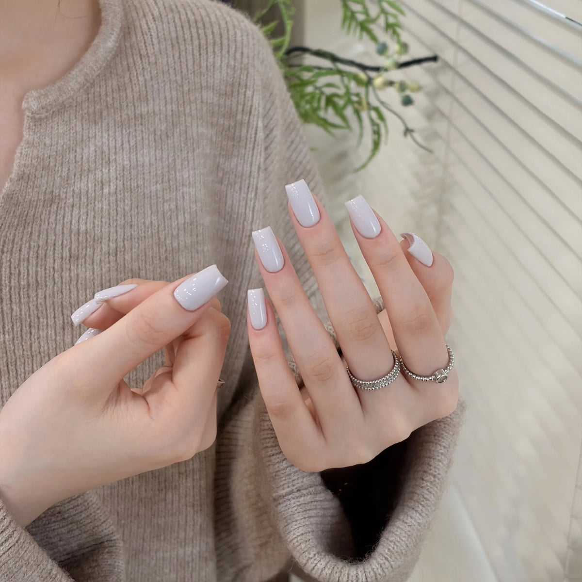 Little Black Bottle solid color gel shade 03 Almond Gray-White on nails
