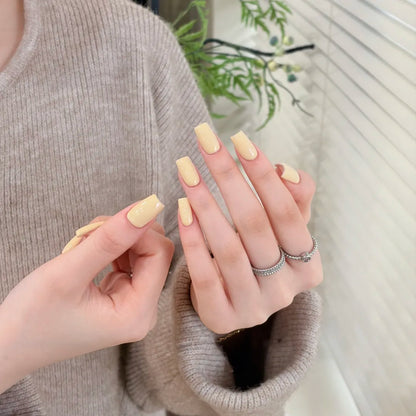 Little Black Bottle solid color gel shade 06 Chick Yellow on nails