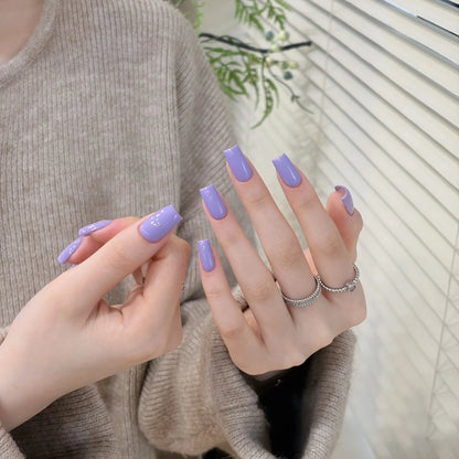 Little Black Bottle solid color gel shade 28 Milky Purple on nails