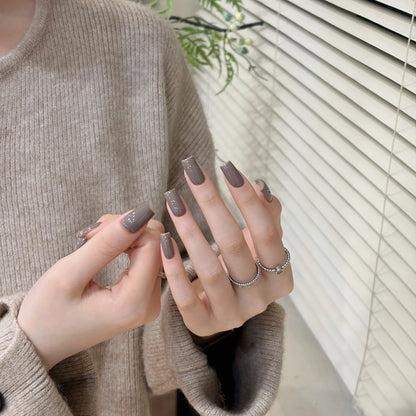 Little Black Bottle solid color gel shade 67 Coffee Brown on nails
