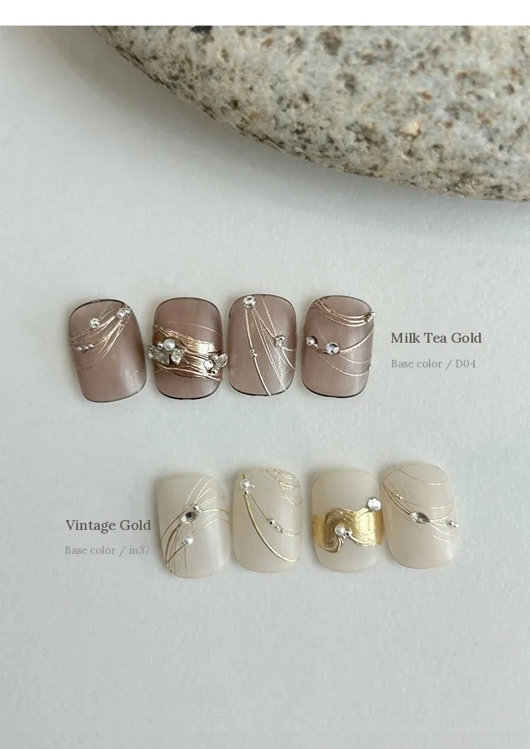 Milk Tea Gold and Vintage Gold nail art over neutral bases