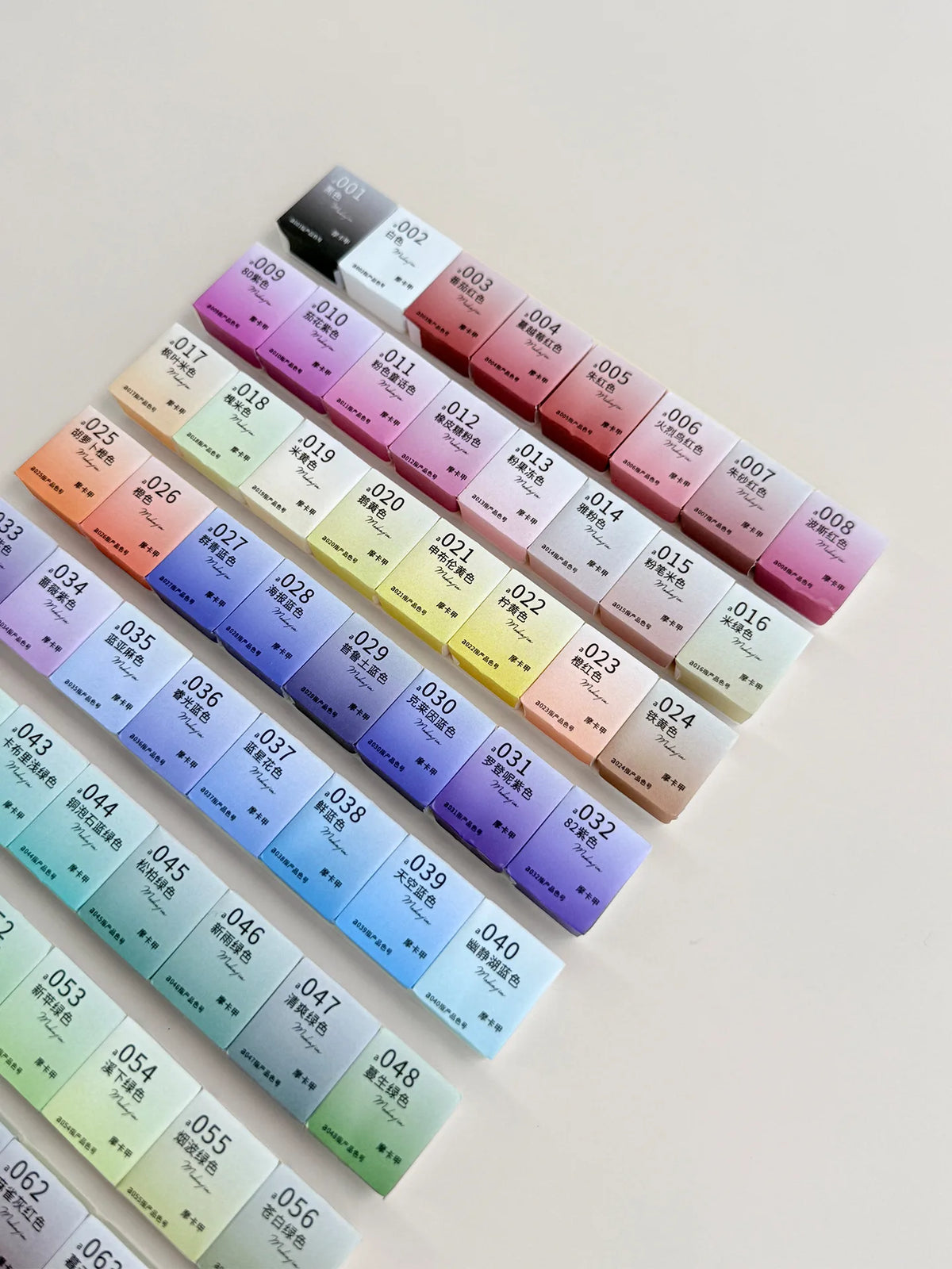 Rows of labeled MOKAJIA painting gel pots