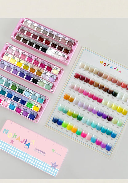 MOKAJIA pat pat gel palette trays beside the swatch card