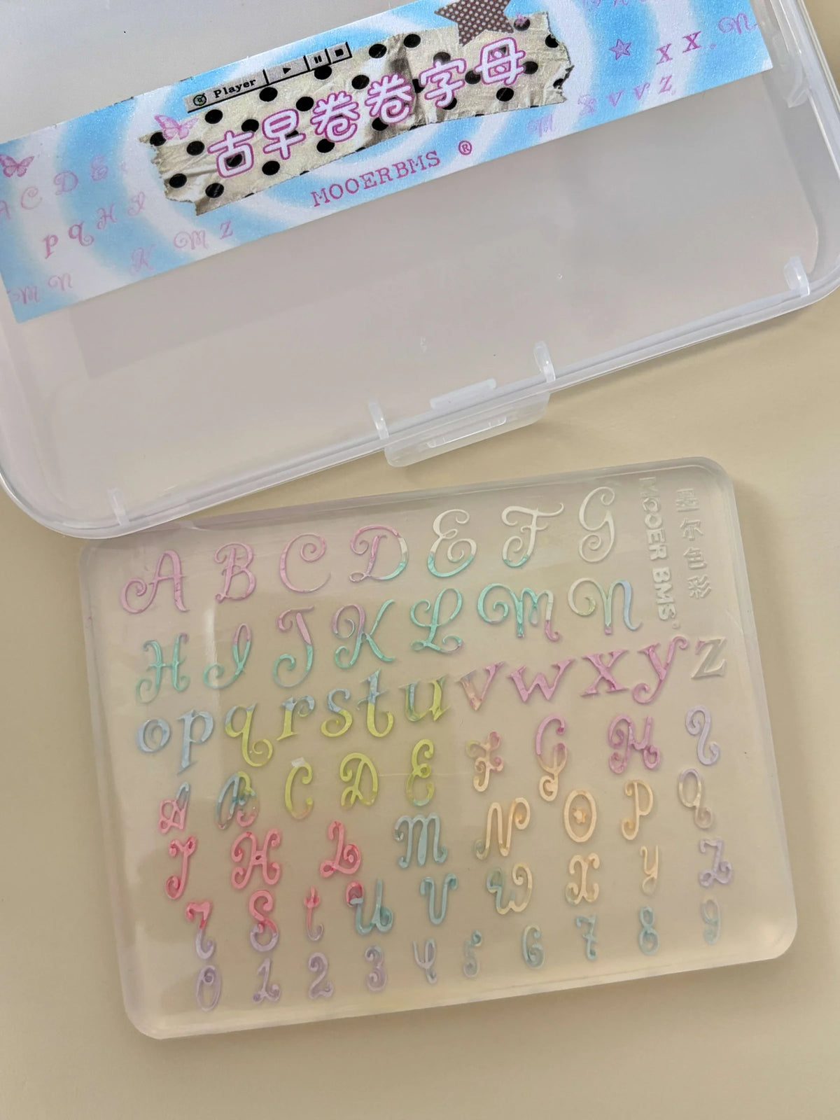 MOOER BMS Curly Alphabet silicone mold with its clear storage case