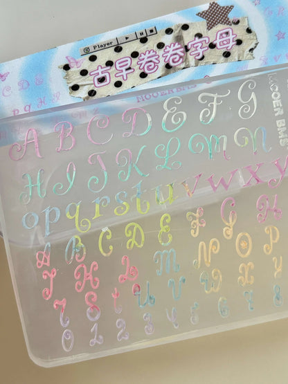 Curly script letters filled with pastel gel