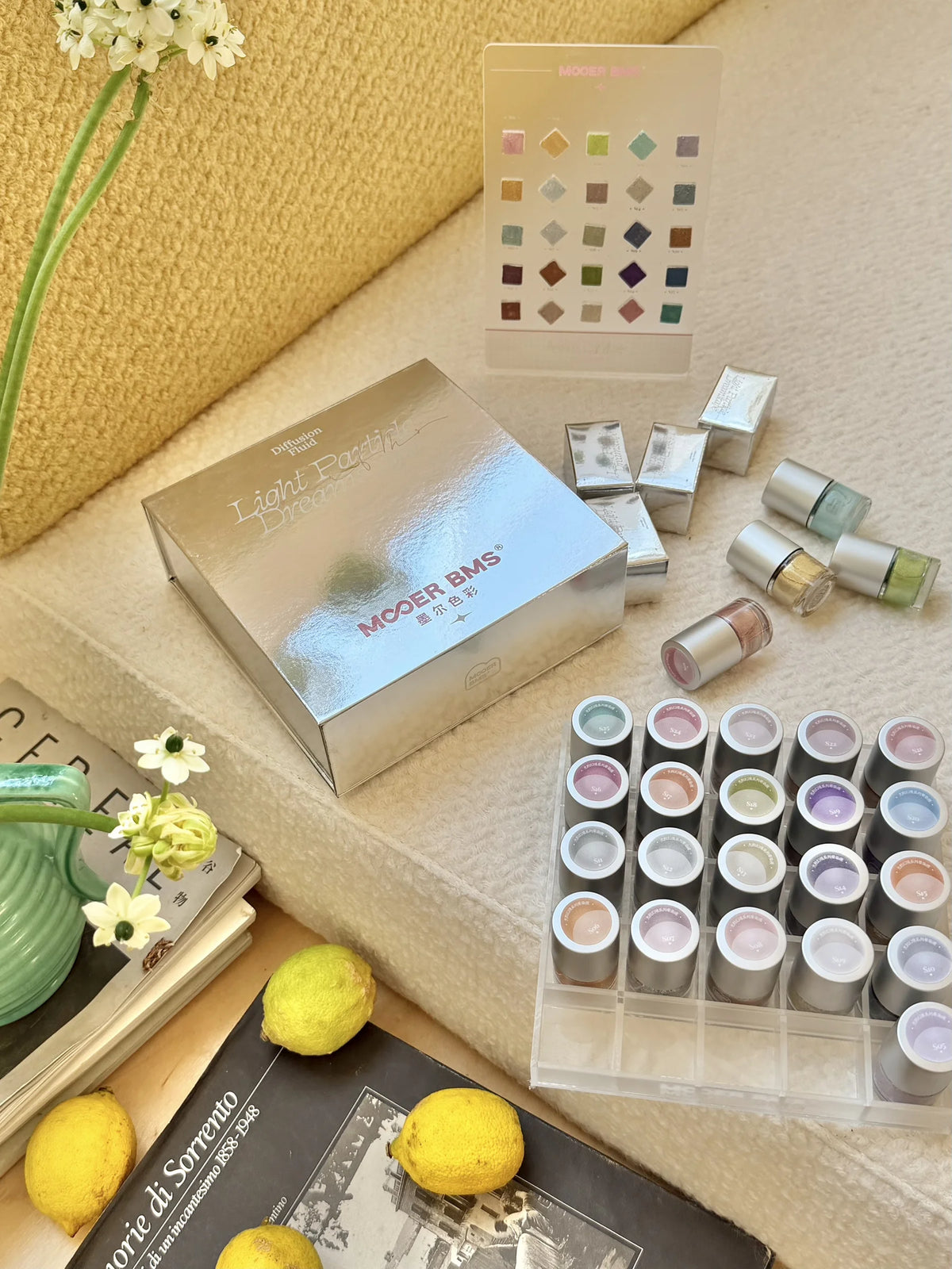 Light Particle Dreamscape set box, display stand and bottles