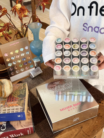 Light Particle Dreamscape bottles and swatch stand with lemons