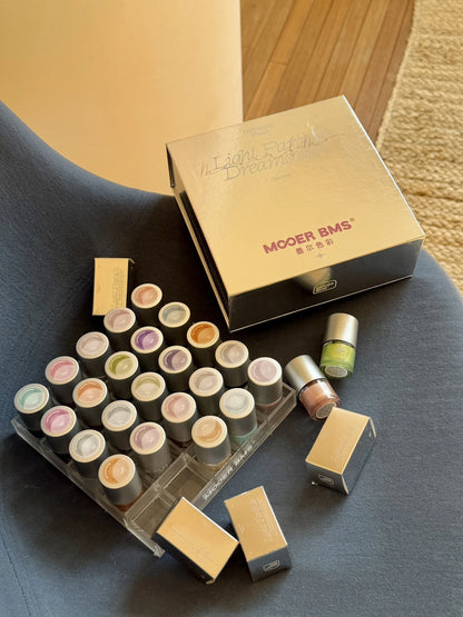 Holding the 25-bottle organizer next to the swatch stand