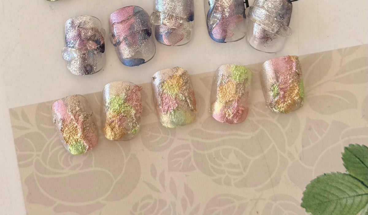 Pastel glitter bloom nail art made with Light Particle Dreamscape