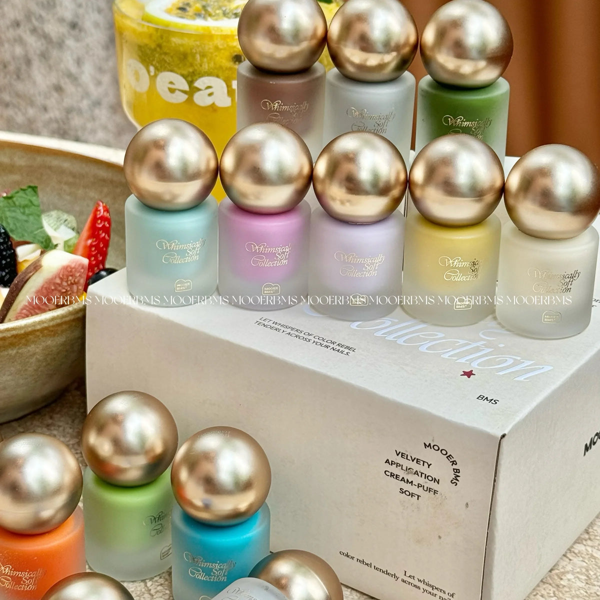 Whimsically Soft bottles lined up on the gift box