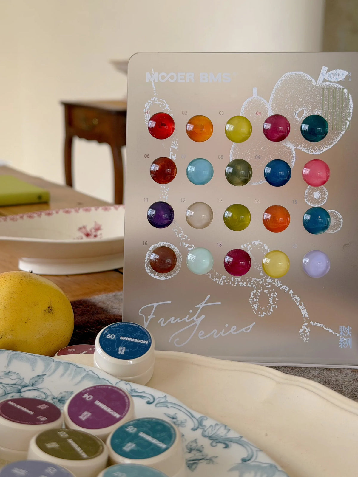 Fruit Series swatches on the acrylic display stand