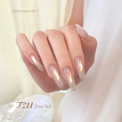 TAYE Moonlight Cup cat eye T214 Vine Veil on long almond nails