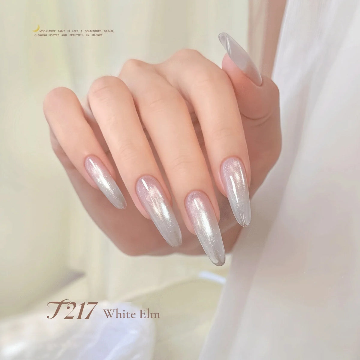 TAYE Moonlight Cup cat eye T217 White Elm on long almond nails