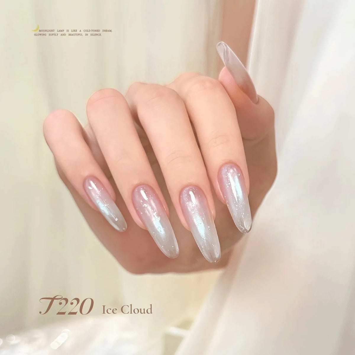 TAYE Moonlight Cup cat eye T220 Ice Cloud on long almond nails