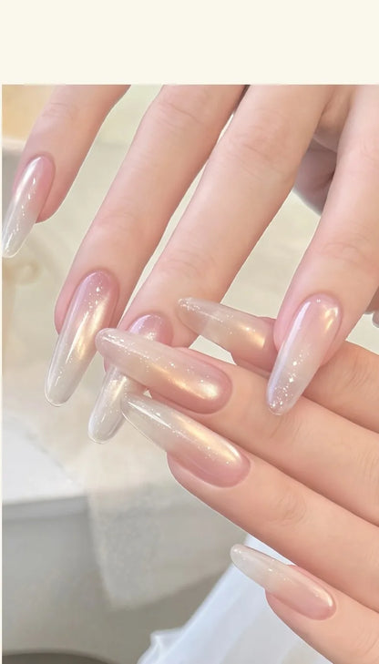 Sheer pearly cat eye on long almond nails