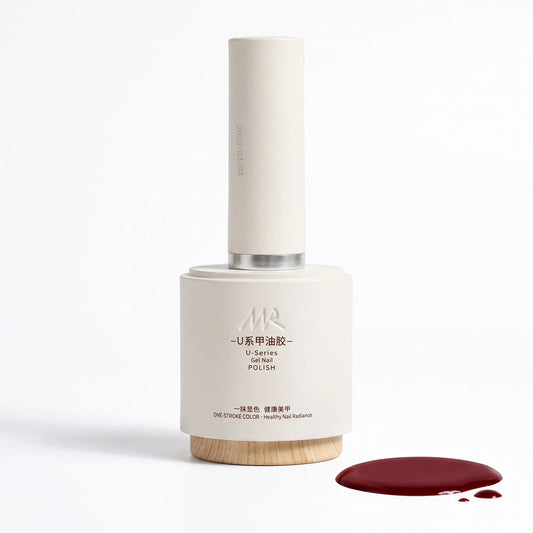 MR NAIL U Series gel nail polish single bottle with matte ivory cap and wooden base beside a deep red gel drop
