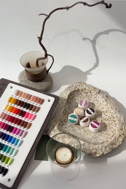 N Series swatch book and jars in a styled setting