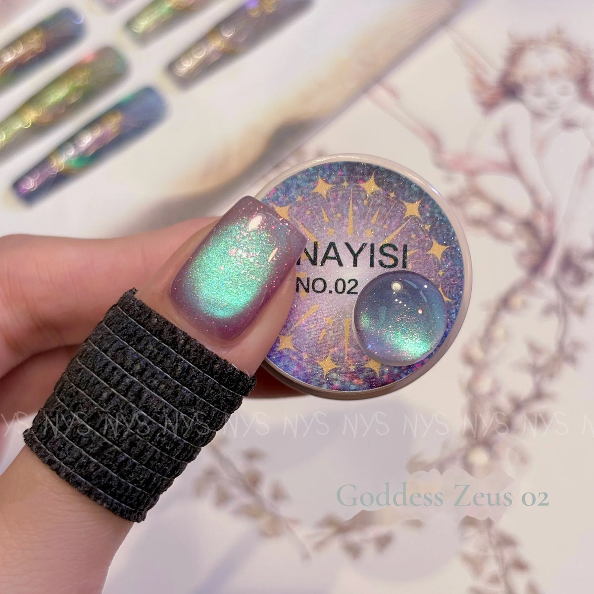Goddess Zeus 02, mint aurora cat eye, on a nail beside its jar