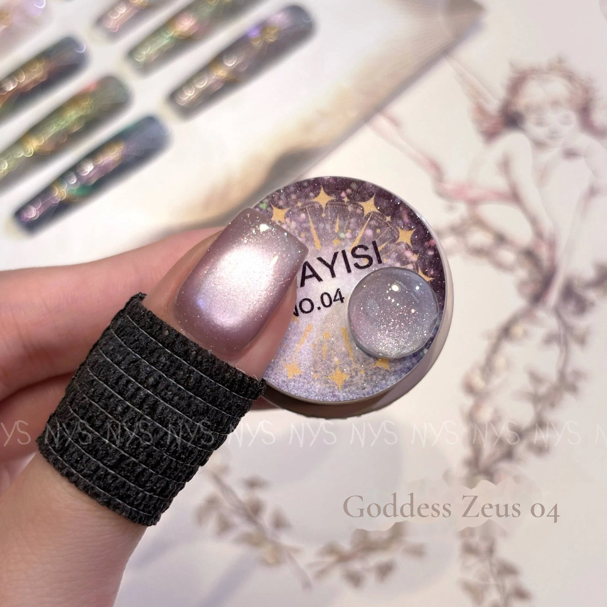 Goddess Zeus 04, pearl lilac cat eye, on a nail beside its jar