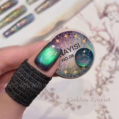 Goddess Zeus 08, emerald teal cat eye, on a nail beside its jar