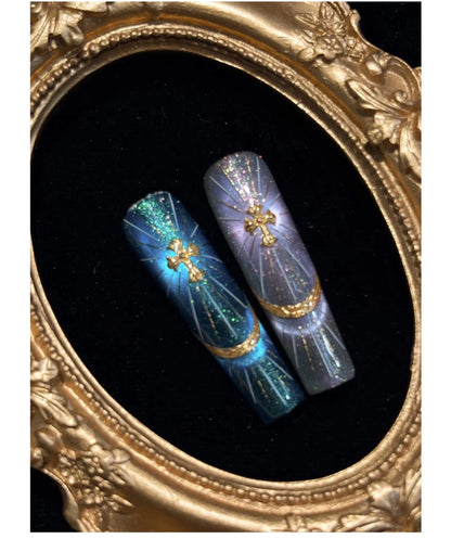 Goddess Zeus cat eye nail art in a gold oval frame