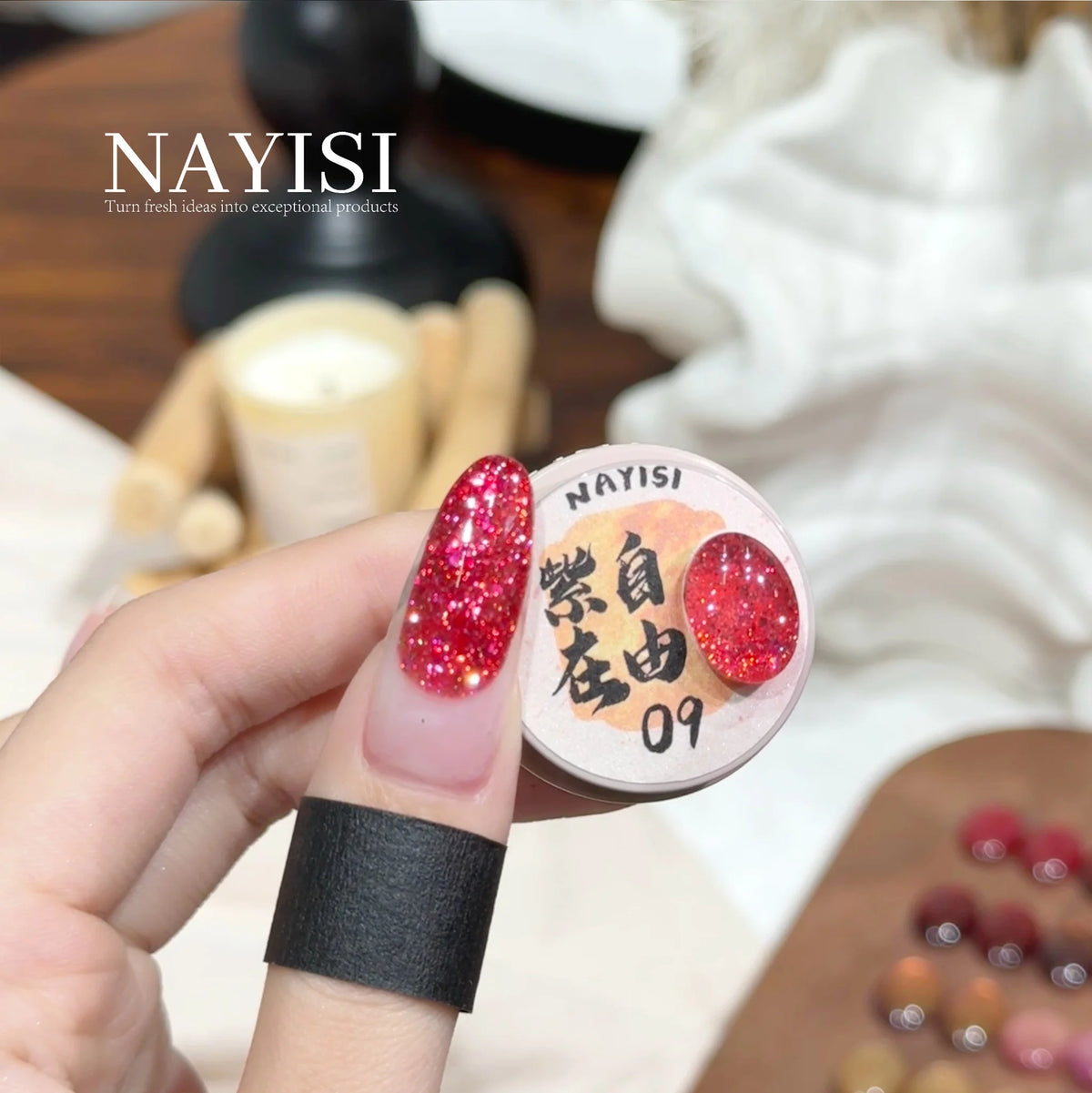 Riches and Treasures 3.0 09, raspberry pink glitter, on a nail beside its jar