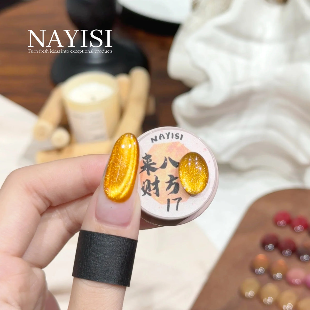 Riches and Treasures 3.0 17, golden yellow cat eye, on a nail beside its jar