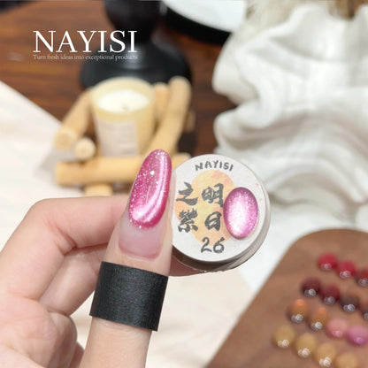 Riches and Treasures 3.0 26, pink sparkle cat eye, on a nail beside its jar