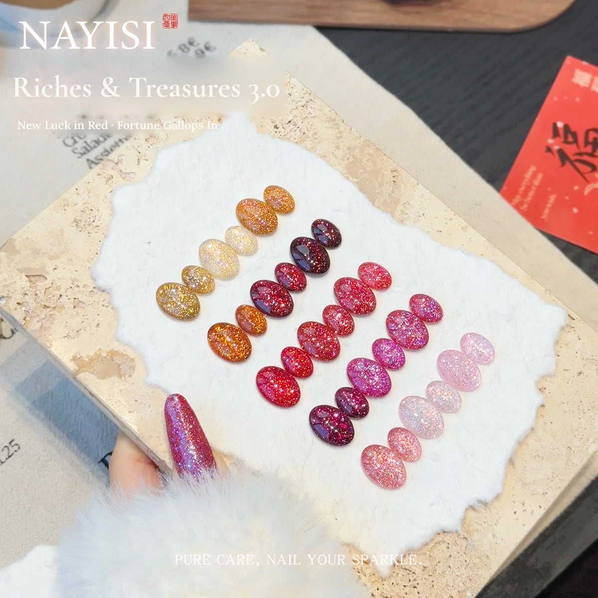 Riches and Treasures 3.0 glitter shades on oval nail tips over a stone tray