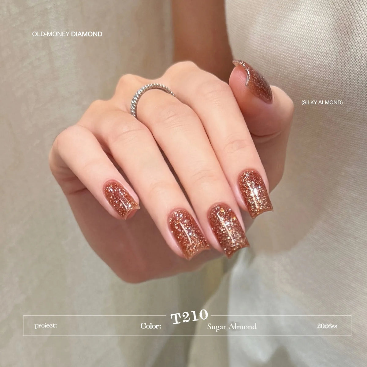 T210 Sugar Almond flash diamond gel on short square nails