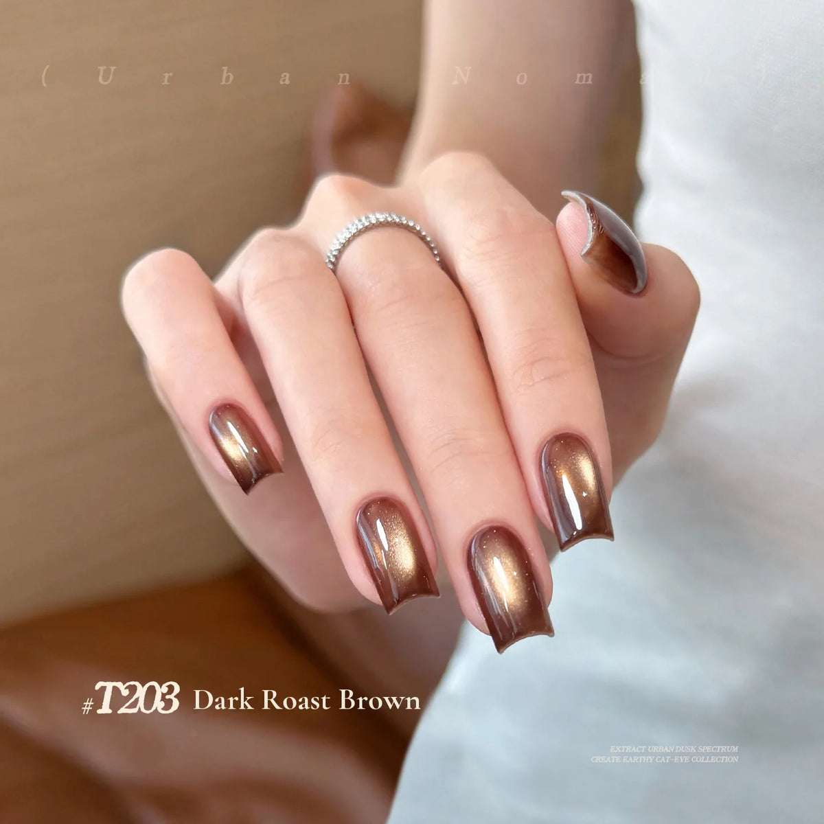 TAYE Urban Nomad T203 Dark Roast Brown cat eye gel polish on nails