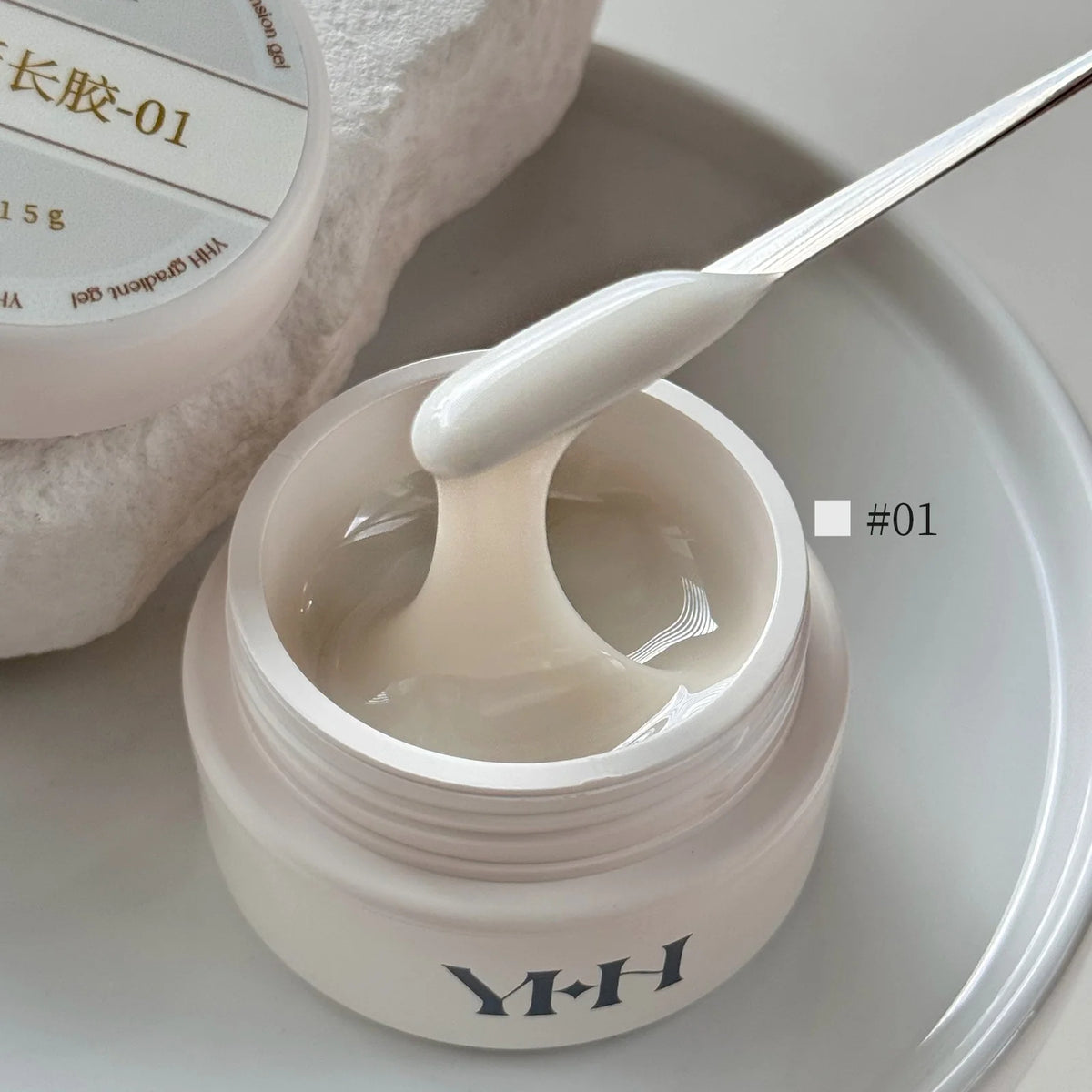 YHH Aqua Glow Extension Gel shade 01, 15 g jar with gel on a spatula