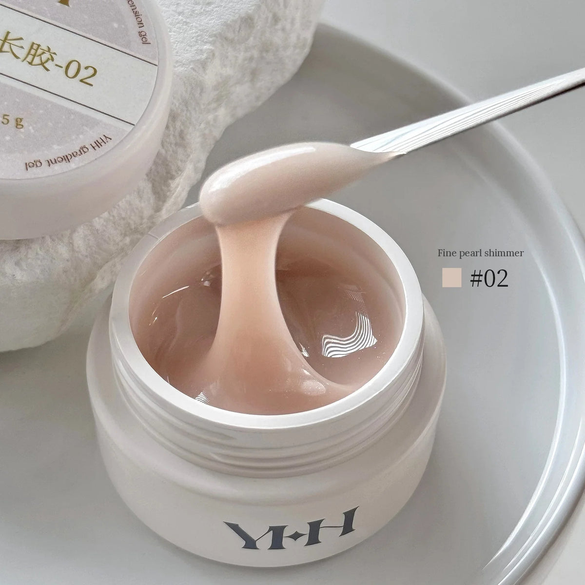 YHH Aqua Glow Extension Gel shade 02, 15 g jar with gel on a spatula