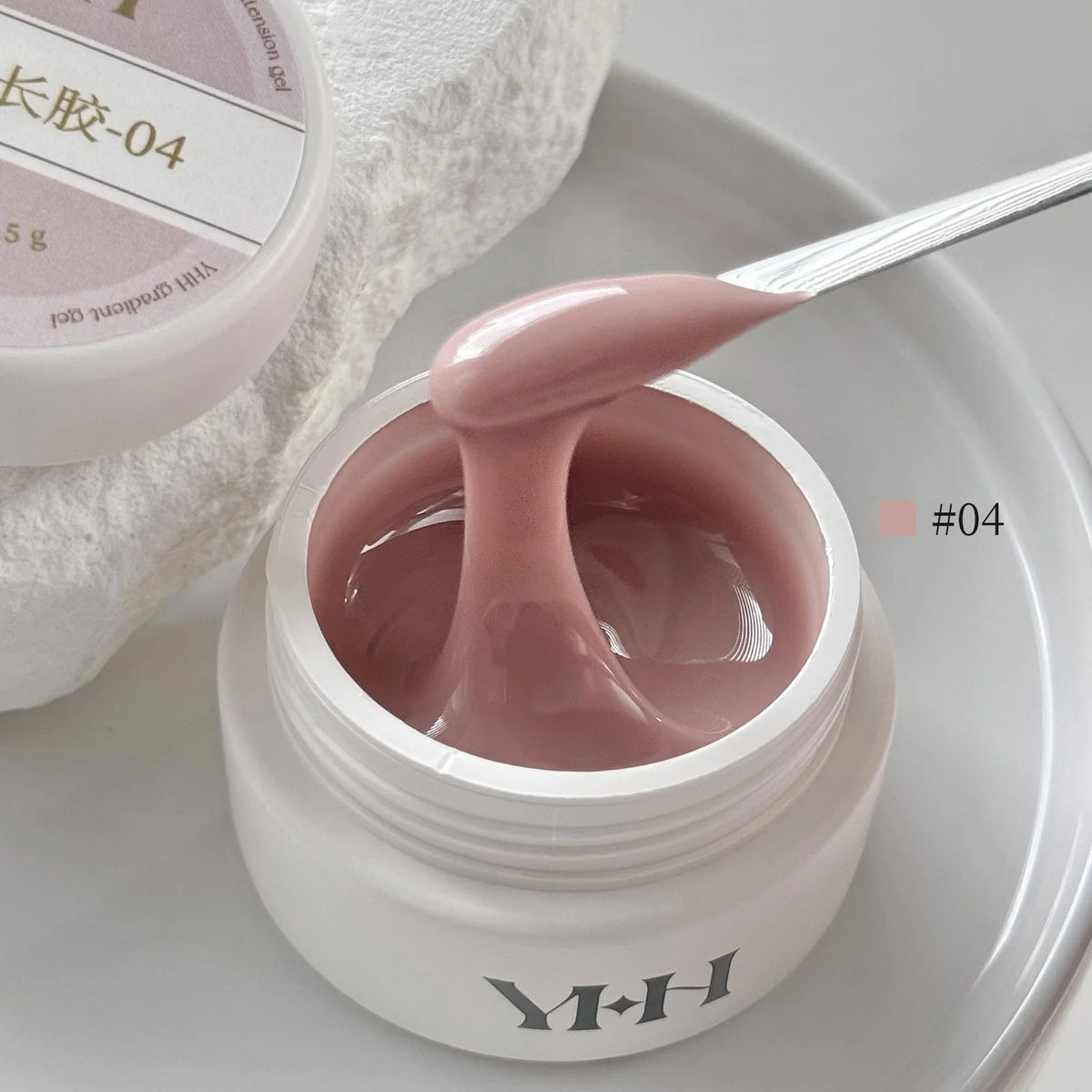 YHH Aqua Glow Extension Gel shade 04, 15 g jar with gel on a spatula