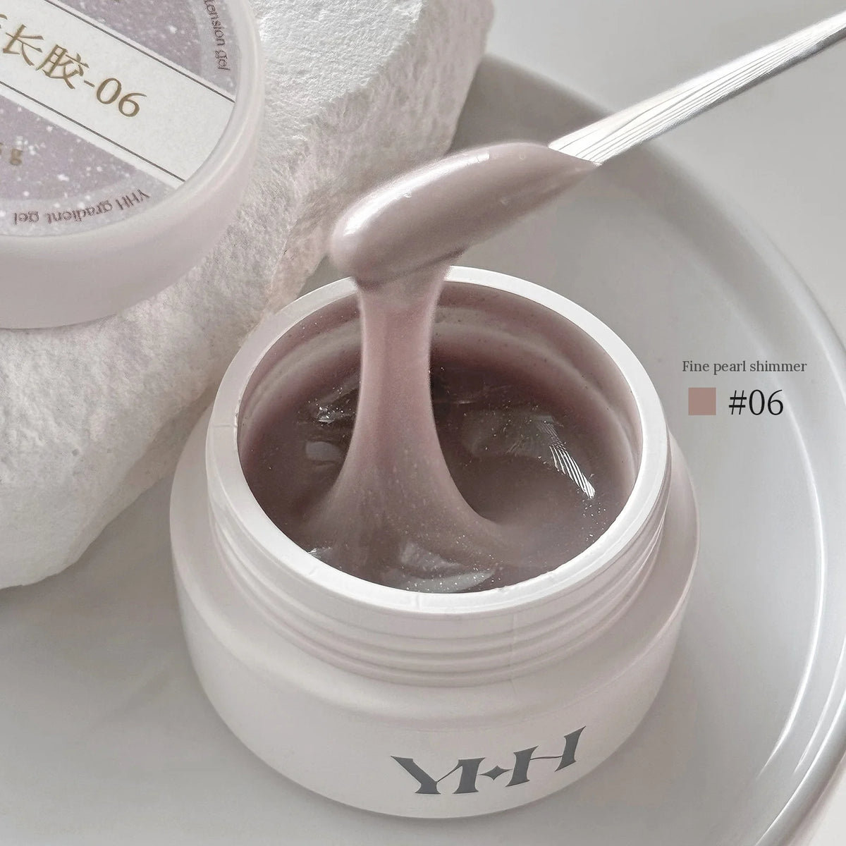 YHH Aqua Glow Extension Gel shade 06, 15 g jar with gel on a spatula