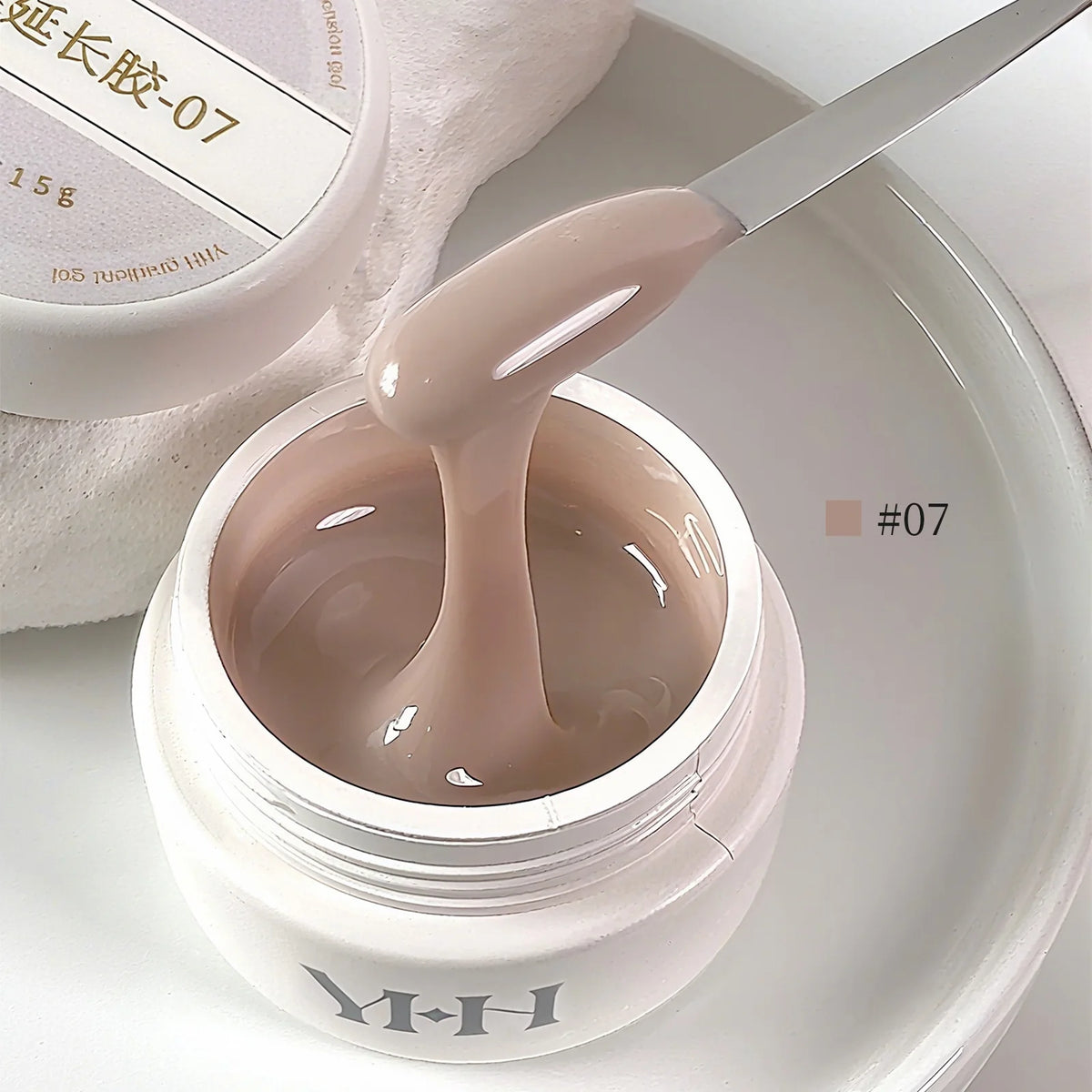 YHH Aqua Glow Extension Gel shade 07, 15 g jar with gel on a spatula
