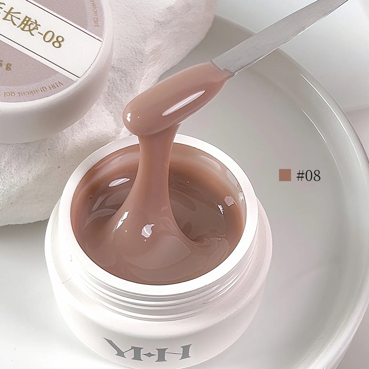 YHH Aqua Glow Extension Gel shade 08, 15 g jar with gel on a spatula