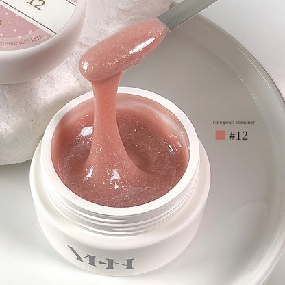 YHH Aqua Glow Extension Gel shade 12, 15 g jar with gel on a spatula