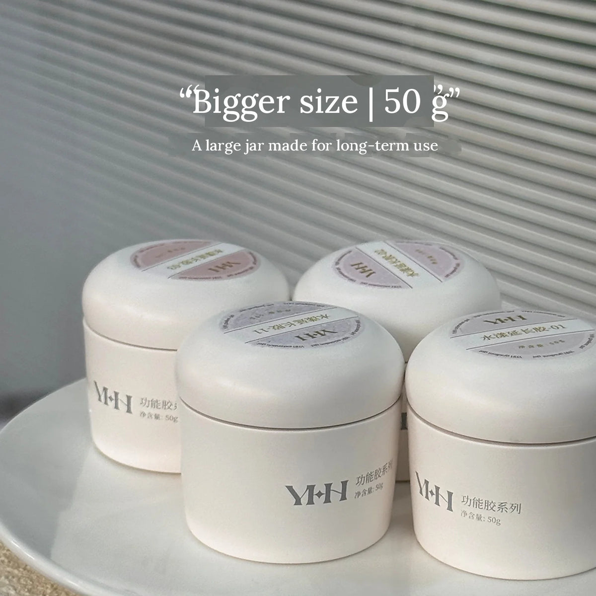 Four 50 g YHH Aqua Glow Extension Gel jars