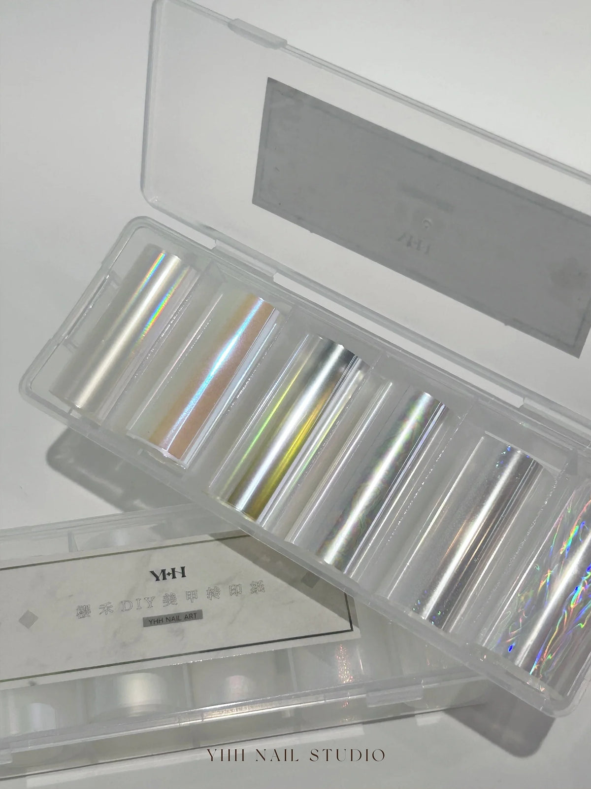 Clear YHH box holding six rolls of aurora transfer paper