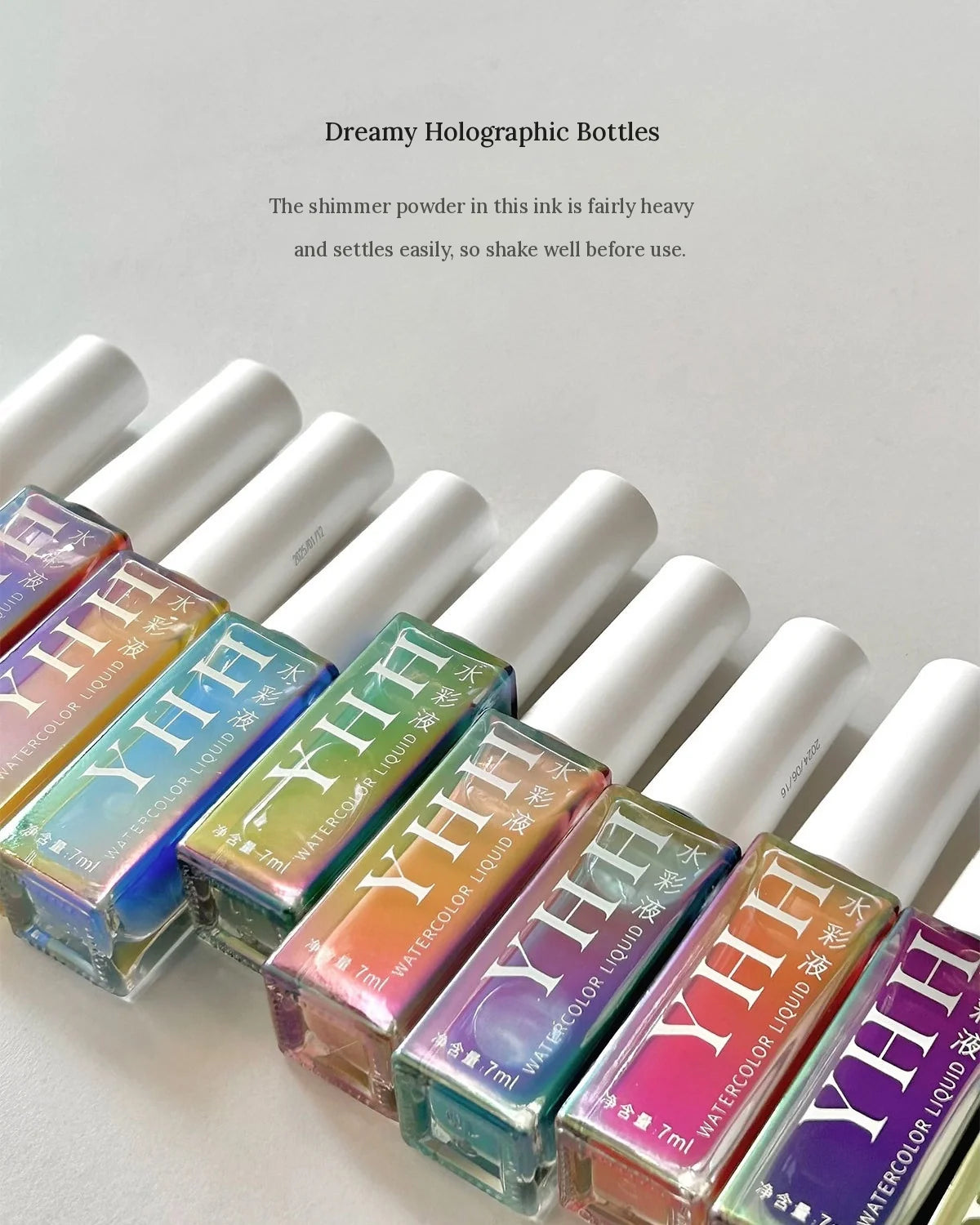 YHH watercolor ink bottles with holographic finish; shake before use